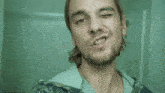 a blurry picture of a man looking at something