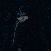 a blurred image of a person 's face with a blue sky in the background