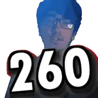 a man wearing glasses stands in front of the number 260
