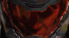 a close up of a video game character 's helmet with a green glow coming out of it .