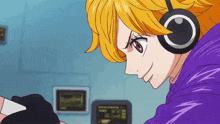 a woman wearing headphones and a purple jacket