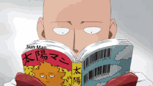 Saitama One Punch Man GIF - Saitama One Punch Man Reading GIFs