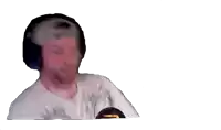a man wearing headphones and a hat is looking at something