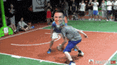 a basketball game is being played in front of a sign that says professor live