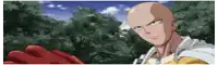 a man with a bald head is standing in front of a forest .