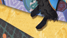 a close up of a person 's feet on a yellow and blue carpet