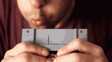 Nintendo Cartridge GIF - Nintendo Cartridge Blow GIFs