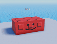 a red brick with a smiley face on it and the word brick below it