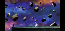 a person standing on a ledge with rocks flying around them