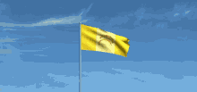 a yellow and white flag with a red circle in the middle