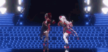 two anime characters are dancing on a stage with blue lights