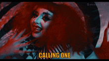 a woman in a clown costume with the words calling one above her