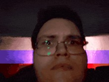 a close up of a person 's face with a flag in the background