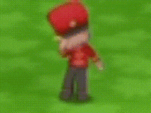 a blurred image of a person wearing a red hat with the word coca cola on it .