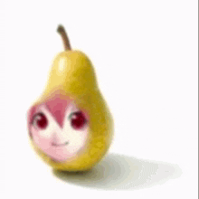 a pear with a face on it is sitting on a white surface .