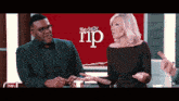 a man and a woman are sitting in front of a screen that says the daily rip