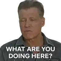 a man in a denim shirt is asking " what are you doing here "