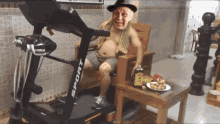 a man is on a treadmill that says sport on it