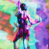 a colorful painting of a person dancing with their arms in the air