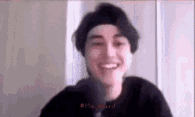 a pixelated image of a man with the hashtag #mayward in red