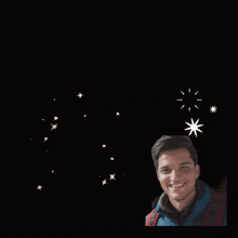 a man is smiling in front of a sign that says jabardast voice and singing super