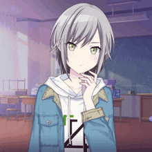 a girl with gray hair and green eyes is wearing a white shirt with the letter n on it