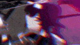 a blurry picture of a person with a purple background and a few lines