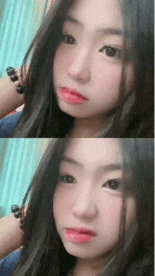 a close up of a girl 's face with a blue curtain in the background