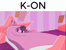 a cartoon character is laying on a bed with the word k-on above her