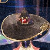 a witch 's hat with a red jewel on it