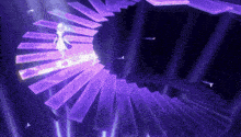 a person is standing on a spiral staircase in a dark room with purple lights .
