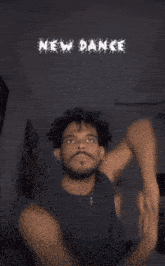 a picture of a man with the words new dance on it