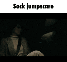 someone is holding a picture of a cartoon character with the words sock jumpscare above it