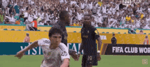 a soccer player with the number 19 on his jersey is running on the field .