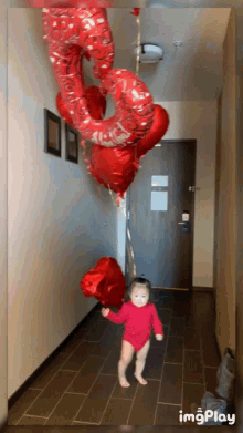 Valentines Day Cute Baby GIF - Valentines Day Cute Baby Red Bodysuit GIFs