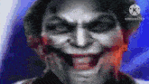 a close up of a joker 's face with the words kinemaster at the top