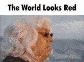 a cartoon of a man with sunglasses and the words " the world looks red "