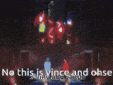 two men are dancing on a stage with the words no this is vince and ohse sunny and tango behind them