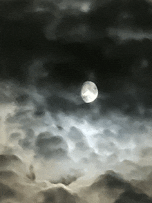 Eerie Moon On Cloud Waves GIF