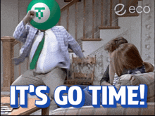 a man with a green ball on his head with the words it 's go time
