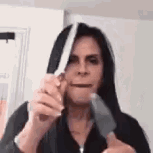Gretchen Sharpening Knife GIF - Gretchen Sharpening Knife Afiando Faca GIFs
