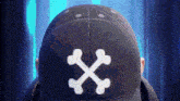 a close up of a person wearing a hat with crossbones on the back