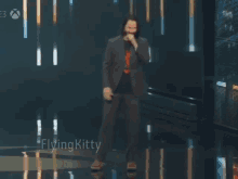 a man in a suit says you 're gay in a meme