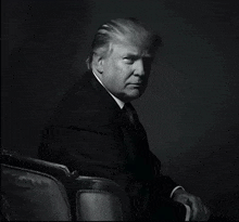 a black and white photo of donald trump in a suit