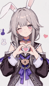 a girl with bunny ears makes a heart with her hands