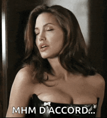 a woman with her eyes closed and the words mhm d' accord