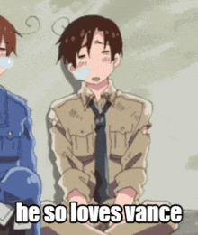 a man in a tie is sitting on the ground with the words he so loves vance above him