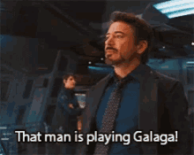 That Man Is Playing Galaga Robert Downey Jr GIF - That Man Is Playing Galaga Robert Downey Jr GIFs