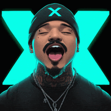 a man with a beard wearing a black beanie with an x on it