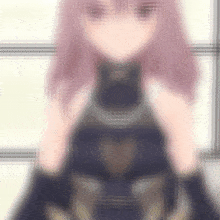 a blurred image of a girl with pink hair